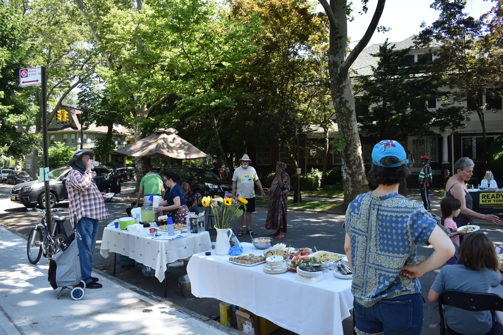 Neighbors gathered mid-block at a DPWNA block party