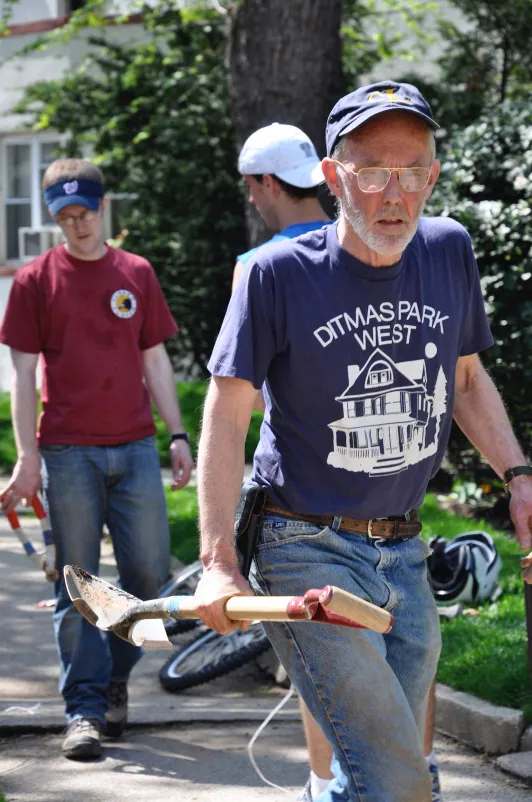 David Ford, a long-time DPWNA neighbor, beside a Red Maple on Rugby Road